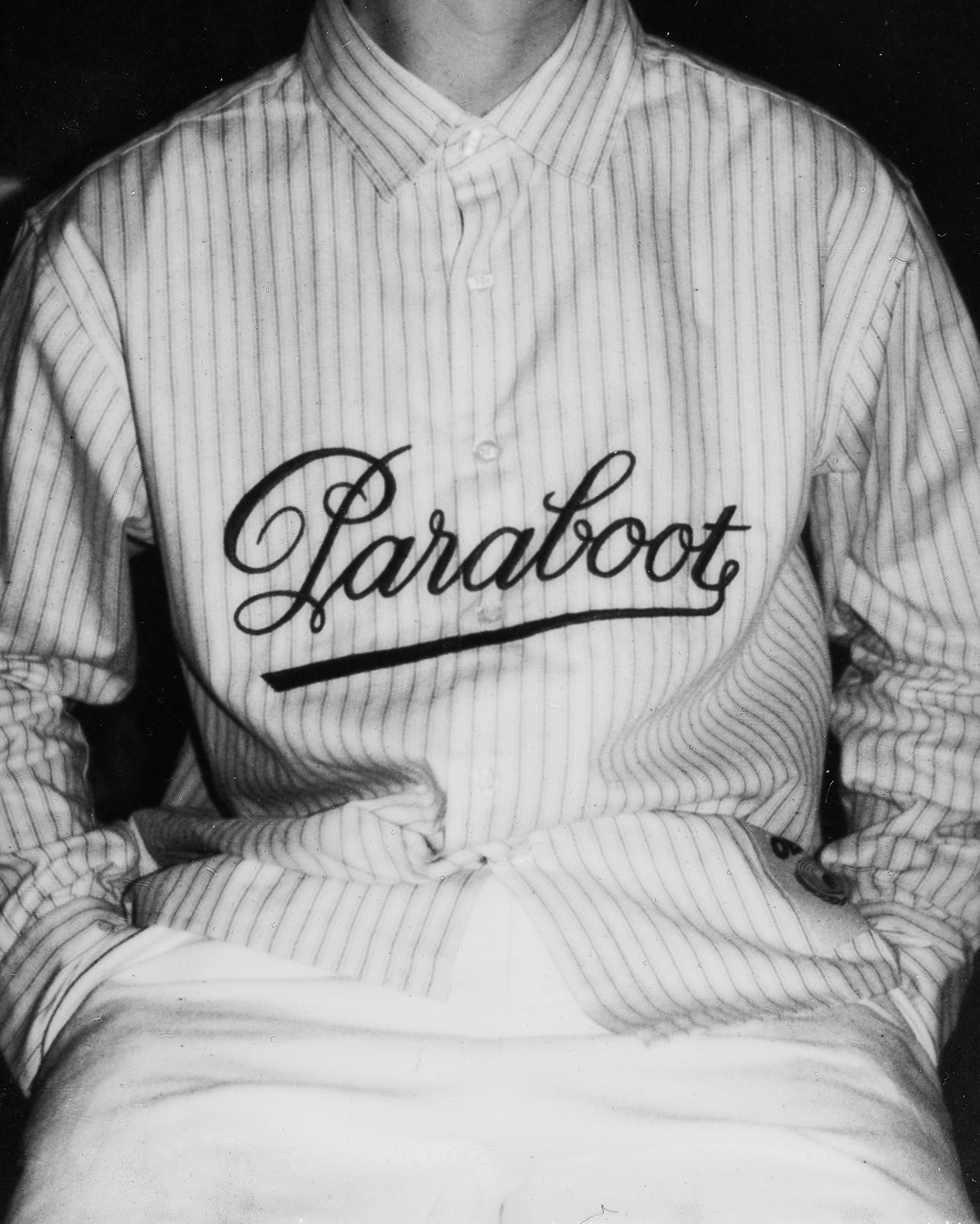 black and white detail shot of Paraboot x Obey shirt