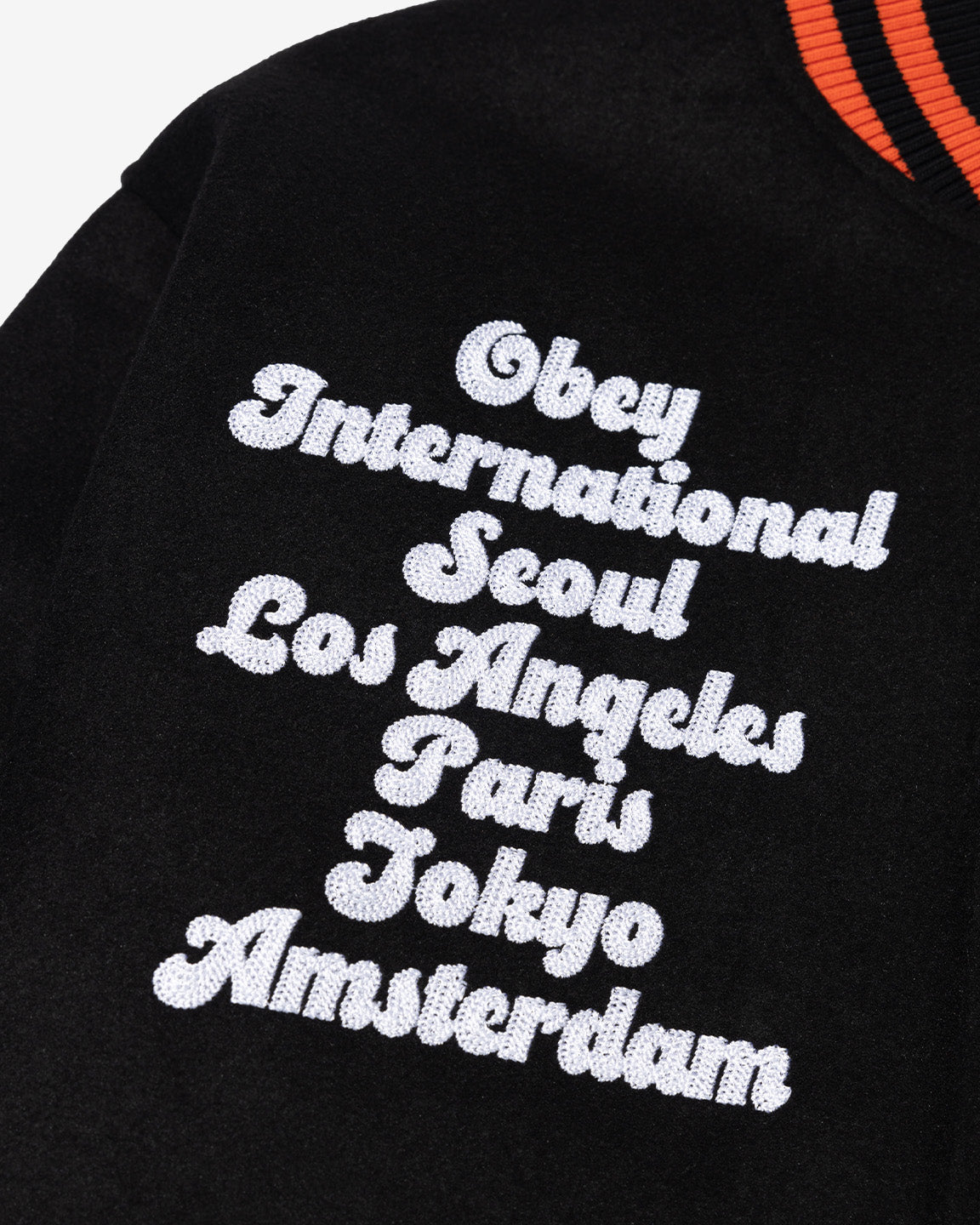 WORLDWIDE SEOUL VARSITY JACKET BLACK / ORANGE